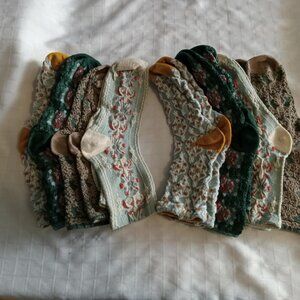 8 new pairs of stockings  with embroidery (4 different designs) sizes 4-7